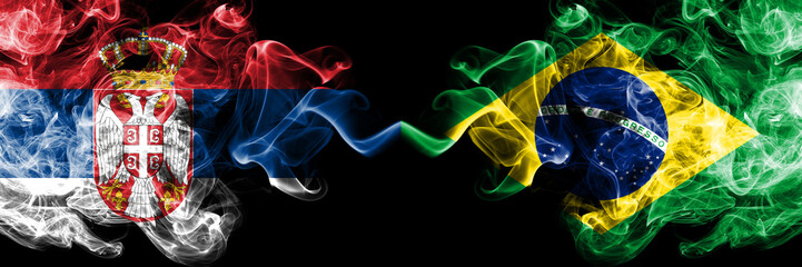 Serbia vs Brazil, Brazilian smoky mystic flags placed side by side. Thick colored silky smokes...