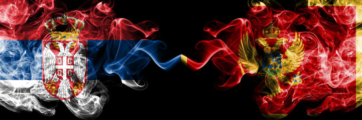 Serbia vs Montenegro, Montenegrin smoky mystic flags placed side by side. Thick colored silky...
