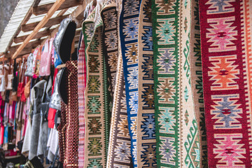 Traditional romanian carpets on sale in the Carpathian Mountains, Romania
