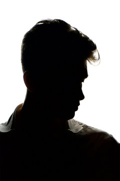 Silhouette of a young man isolated on white