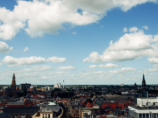 Obraz premium View over historic part of Groningen city under blue sky with clouds