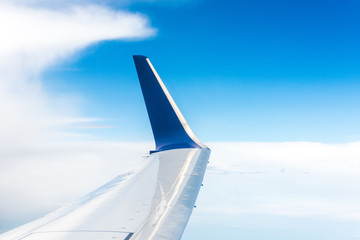 Wing of an aiplane viewed from the inside of the aircraft