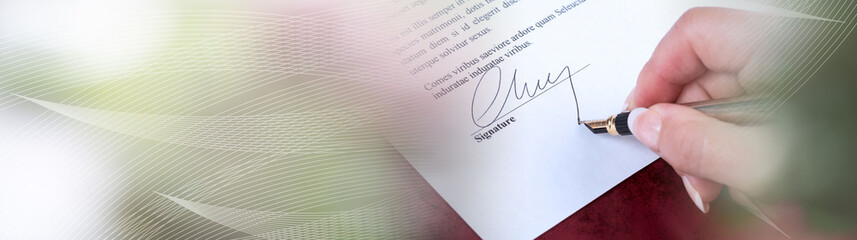 Hand signing a contract; panoramic banner