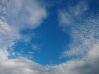 white clouds in the blue sky natural background beautiful nature space for write 