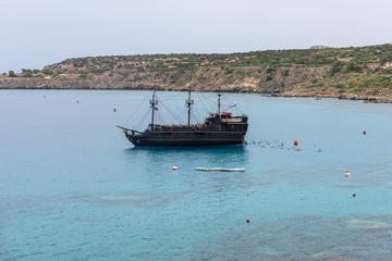 Touristic boat navigating in the Mediterranean Sea in Cyprus