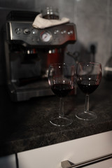 Close up of red wine glasses with lipstick mark