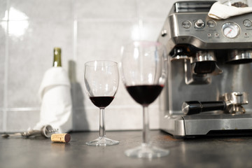 Close up of red wine glasses with lipstick mark