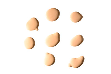 Liquid foundation swatch isolated on white background. Close Up of makeup cream sample.