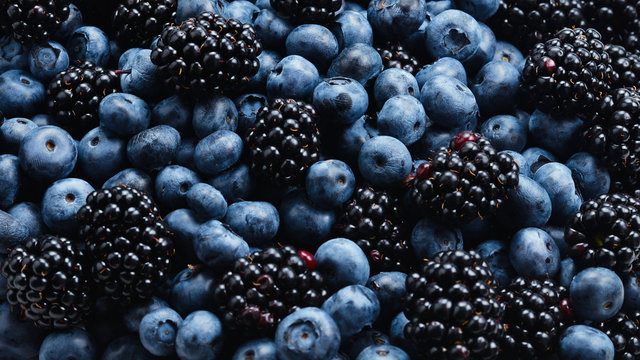 Blackberry and  blueberry background. Top view.