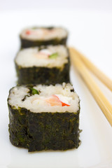 Japanese cuisine, rice sushi and fish - closeup