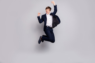 Full length body size view photo of nice ecstatic child children raise fists scream shout yes yeah have aims achievement dressed black white blazers jackets trousers isolated grey background