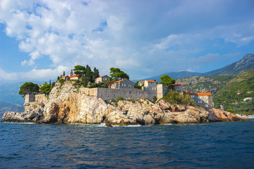 Fototapeta na wymiar Sveti Stefan island in Montenegro. Sea view on a Sunny day.