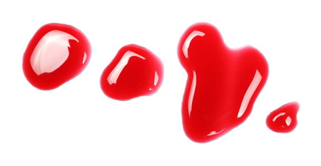 Spilled red wine puddle isolated on white background, top view