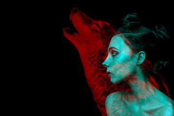 Gothic girl and wolf double exposure on black background. Werewolf concept. space for text