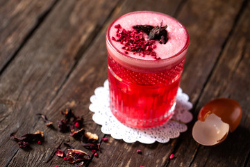 Tasty cocktail drink with an egg shell