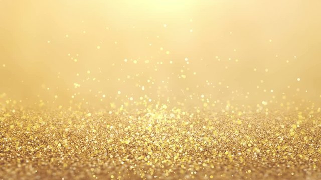 Abstract gold bokeh background. Motion round glitter particles. Christmas stage footage. 