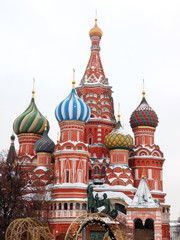 Moscow, Russia - January 31, 2019: Saint Basil's Cathedral covered with snow in Red Square on a cloudy day