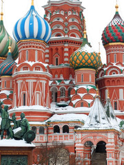 Fototapeta na wymiar Moscow, Russia - January 31, 2019: Saint Basil's Cathedral covered with snow in Red Square on a cloudy day
