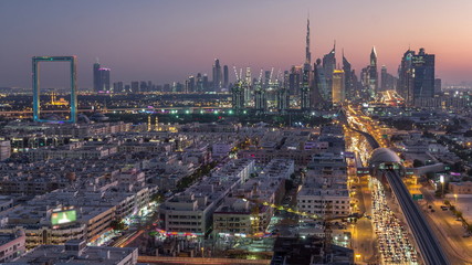 Dubai skyline after sunset with beautiful city center lights and Sheikh Zayed road traffic timelapse, Dubai, United Arab Emirates