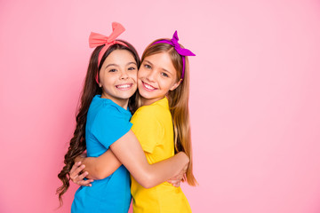 Portrait of lovely kids have free time vacation fun isolated over pink background