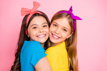 Portrait of sweet buddies have free time enjoy feel cheerful isolated over pink background