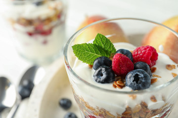 Parfaits and pears on white wooden table, space for text