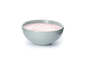 Bowl with fruit yogurt isolated on white background