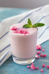 Close up of fruit yougurt smoothie - health living concept