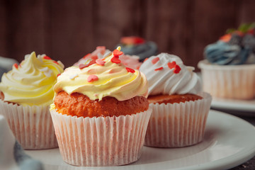Homemade cupcakes traditional American sweet baked dessert with berries