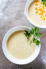 Vegetable soup on stone table