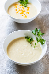Vegetable soup on stone table