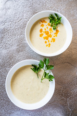 Vegetable soup on stone table