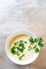 Vegetable soup on stone table