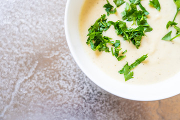 Vegetable soup on stone table
