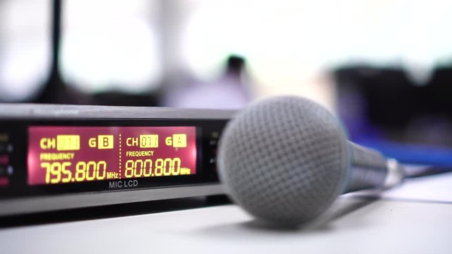 Microphone for speaker speech with digits radio frequency transceiver or transmitter to show spectrum display wireless microphones receiver in conference hall or meeting room