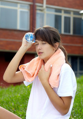 teenage girlrefreshing with water thirsty sport fitness