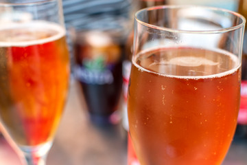 Take something among friends. Different types of drink on the table.