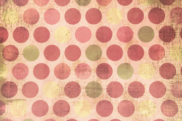 Ronds colorés positionnés en ligne sur fond rose tendre. Thématique noël vintage