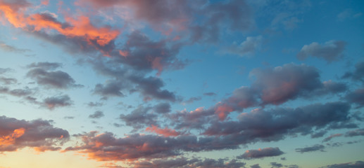 Beautiful clouds at sunset as background