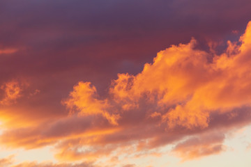 Beautiful clouds at sunset as background