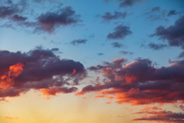 Beautiful clouds at sunset as background