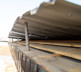 Installation of metal drain on the roof of the house