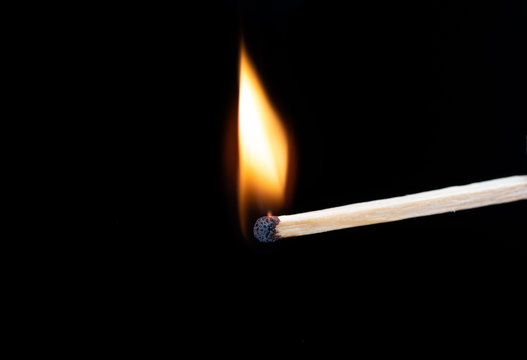 Lighting wooden matches at the moment when it explodes.