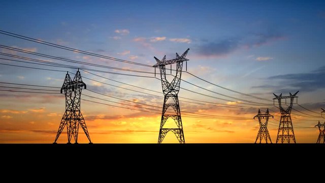 Electricity pylons at sunset