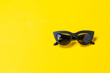 fashion sunglasses on a yellow background
