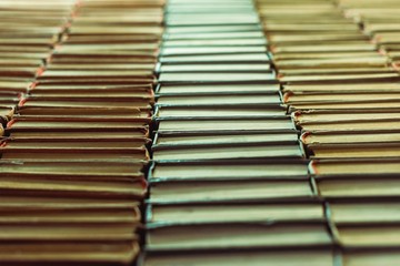 selective focus of retro and vintage books in library