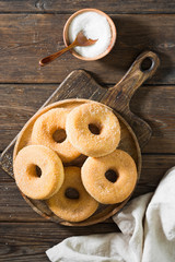 Doughnuts with sugar sprinkles. Rustic style