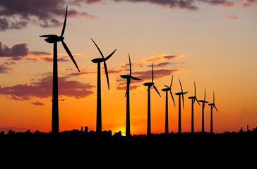 Wind farm at sunset. - 276901732