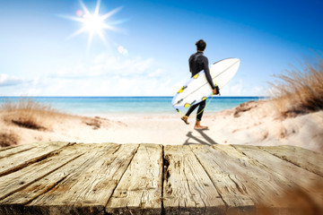 Desk of free space and summer beach background 