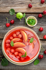 Tasty fruit soup made of fresh summer fruits